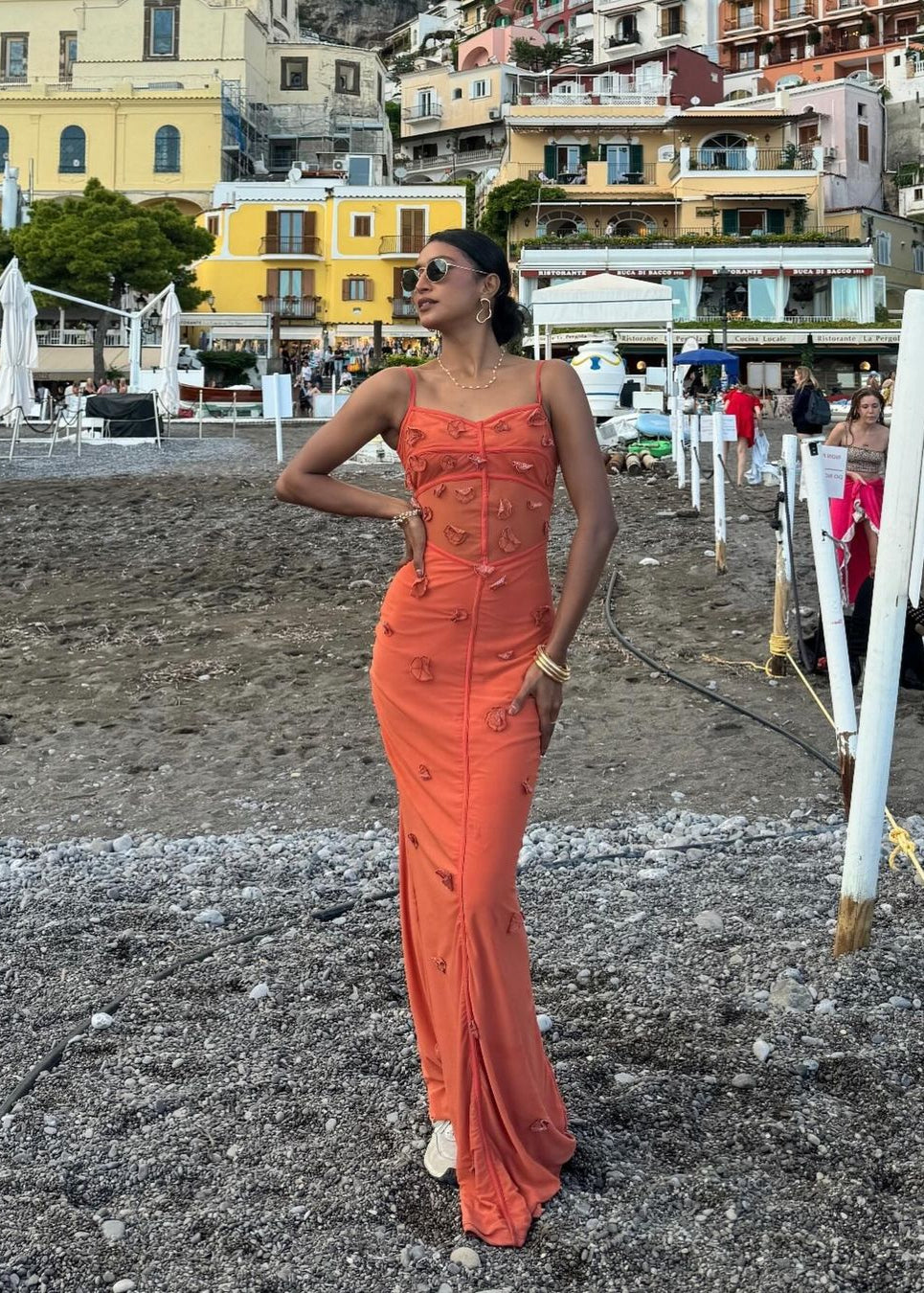 Model wearing the Salomi Rust 3D Flower Bodycon Dress, showcasing intricate 3D floral embellishments on a form-fitting silhouette, offering a stunning and textured look for special occasions