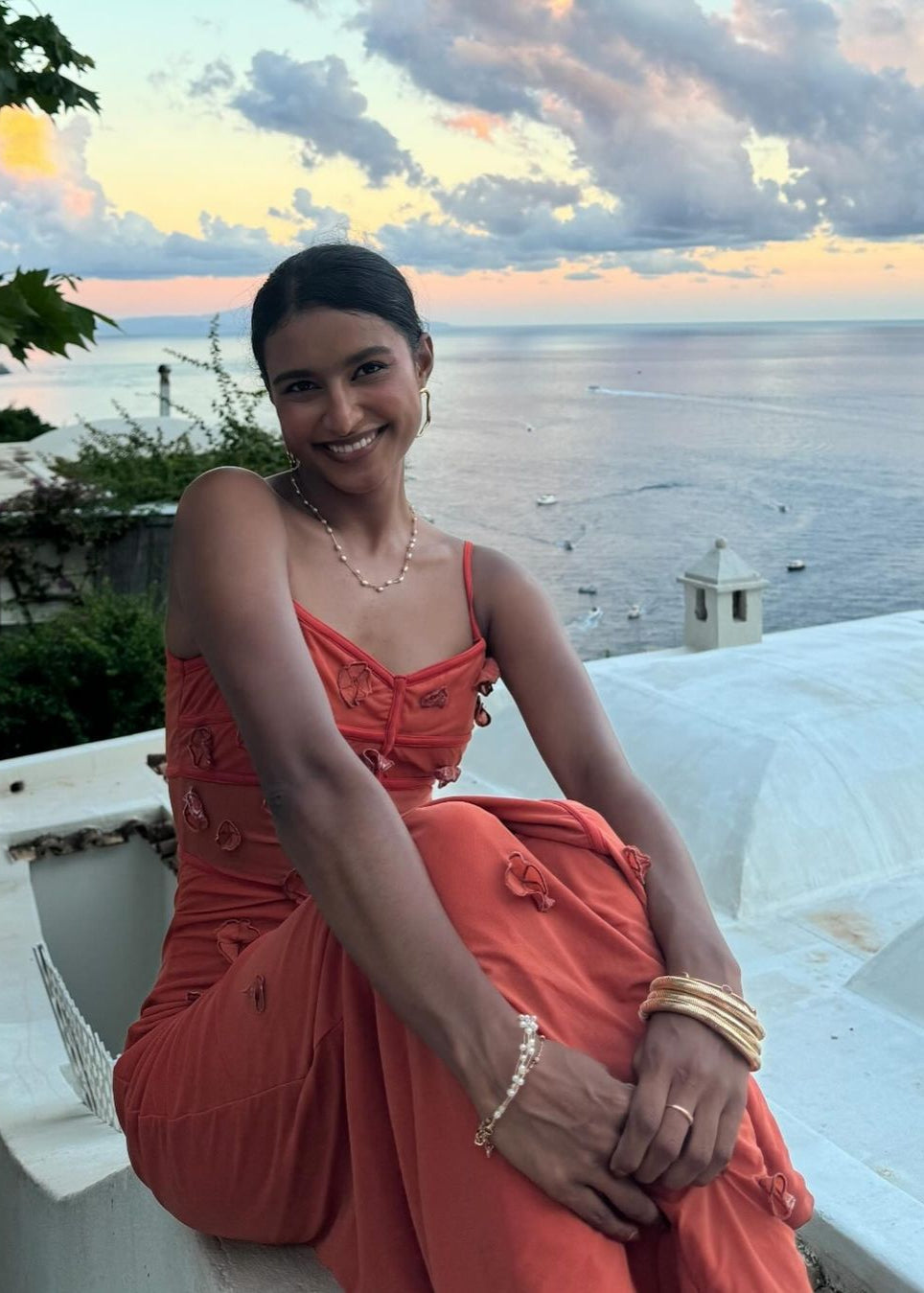 Model wearing the Salomi Rust 3D Flower Bodycon Dress, showcasing intricate 3D floral embellishments on a form-fitting silhouette, offering a stunning and textured look for special occasions
