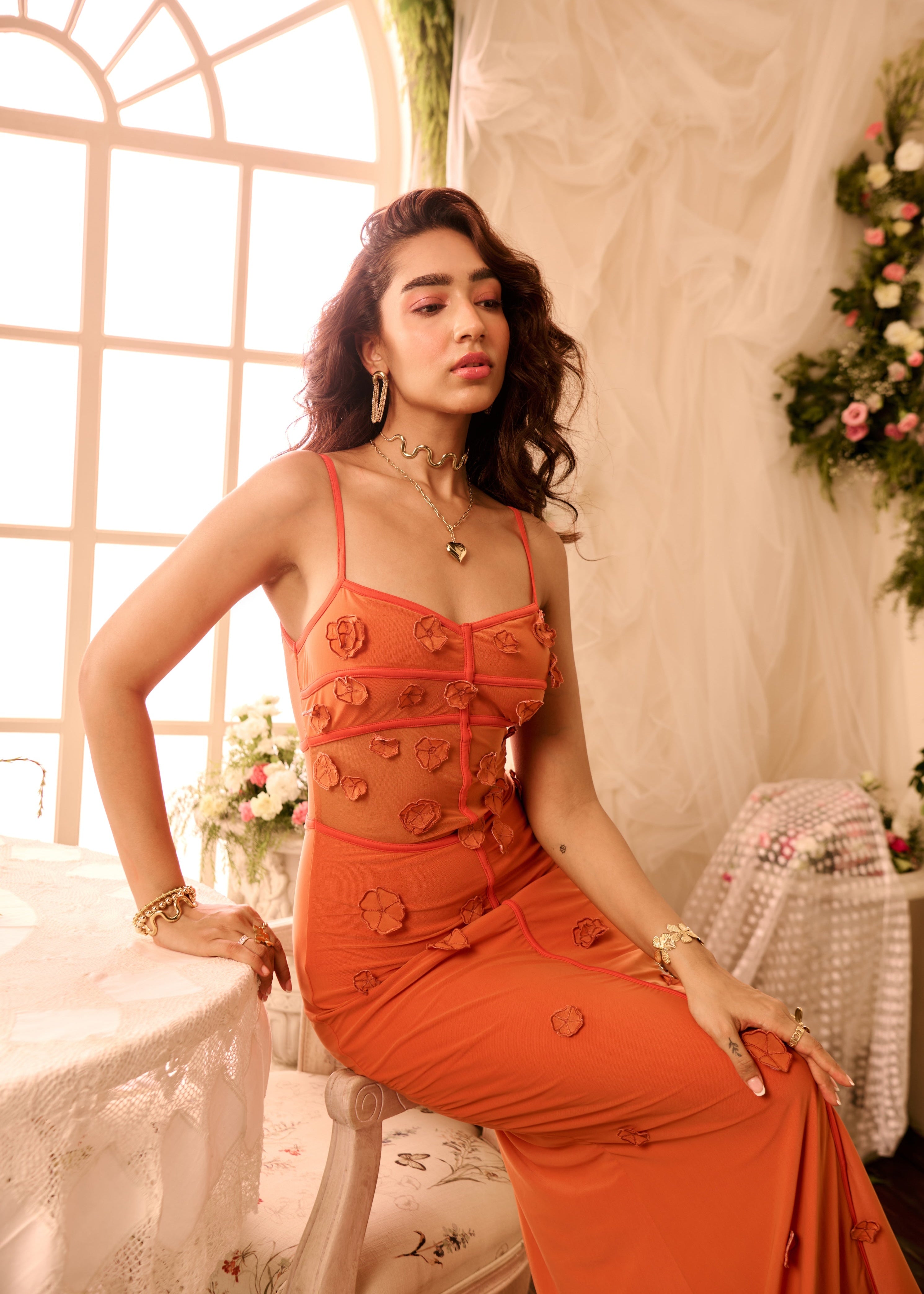 Salomi Rust 3D Flower Bodycon Dress featuring a body-hugging fit with intricate 3D flower embellishments in a rich rust color