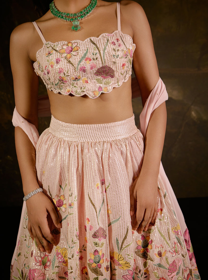 "Ahaana Pink Floral Embroidered Lehenga: Vibrant pink lehenga adorned with intricate floral embroidery for a charming and festive appeal."