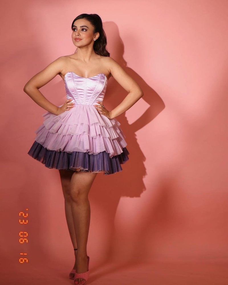 Graceful woman in a Belle Lavender Ombre Ruffle Tulle Corset Dress, showcasing ethereal beauty