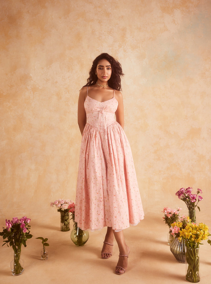 Brynlee Baby Pink Floral Printed Corset Midi Dress, a charming floral-printed dress with a fitted bodice and midi-length skirt in soft baby pink.