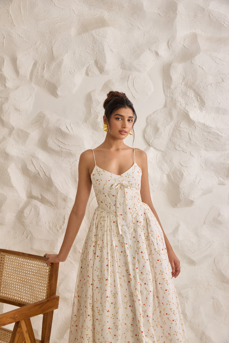 A graceful Brynlee white midi dress featuring a floral print and a corset bodice.