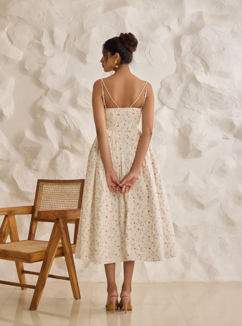 A graceful Brynlee white midi dress featuring a floral print and a corset bodice.