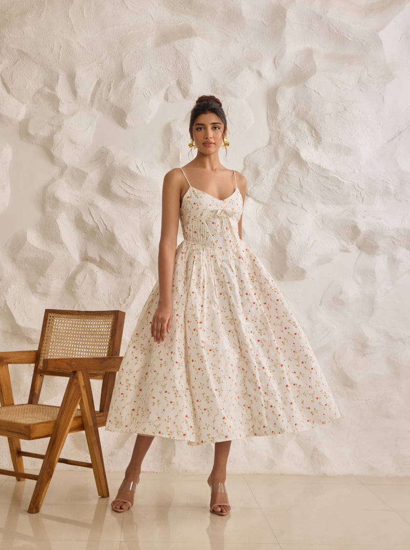 A graceful Brynlee white midi dress featuring a floral print and a corset bodice.