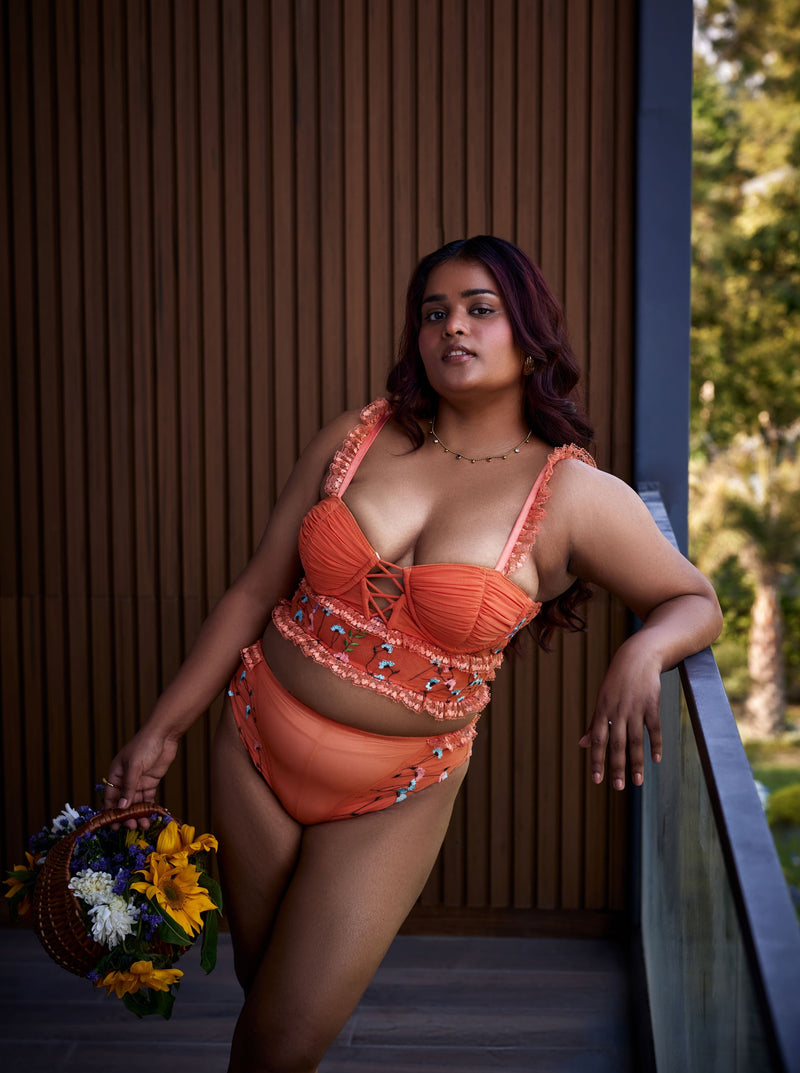 Cassandra Orange Floral Embroidered Balconet Bralette: A vibrant orange bralette adorned with floral embroidery, combining elegance and comfort.