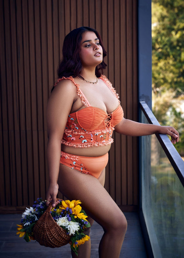 Cassandra Orange Floral Embroidered Balconet Bralette: A vibrant orange bralette adorned with floral embroidery, combining elegance and comfort.