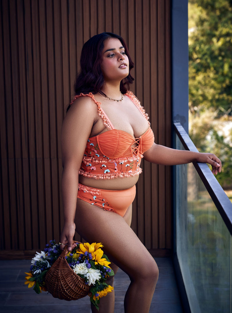 Cassandra Orange Floral Embroidered Balconet Bralette: A vibrant orange bralette adorned with floral embroidery, combining elegance and comfort.