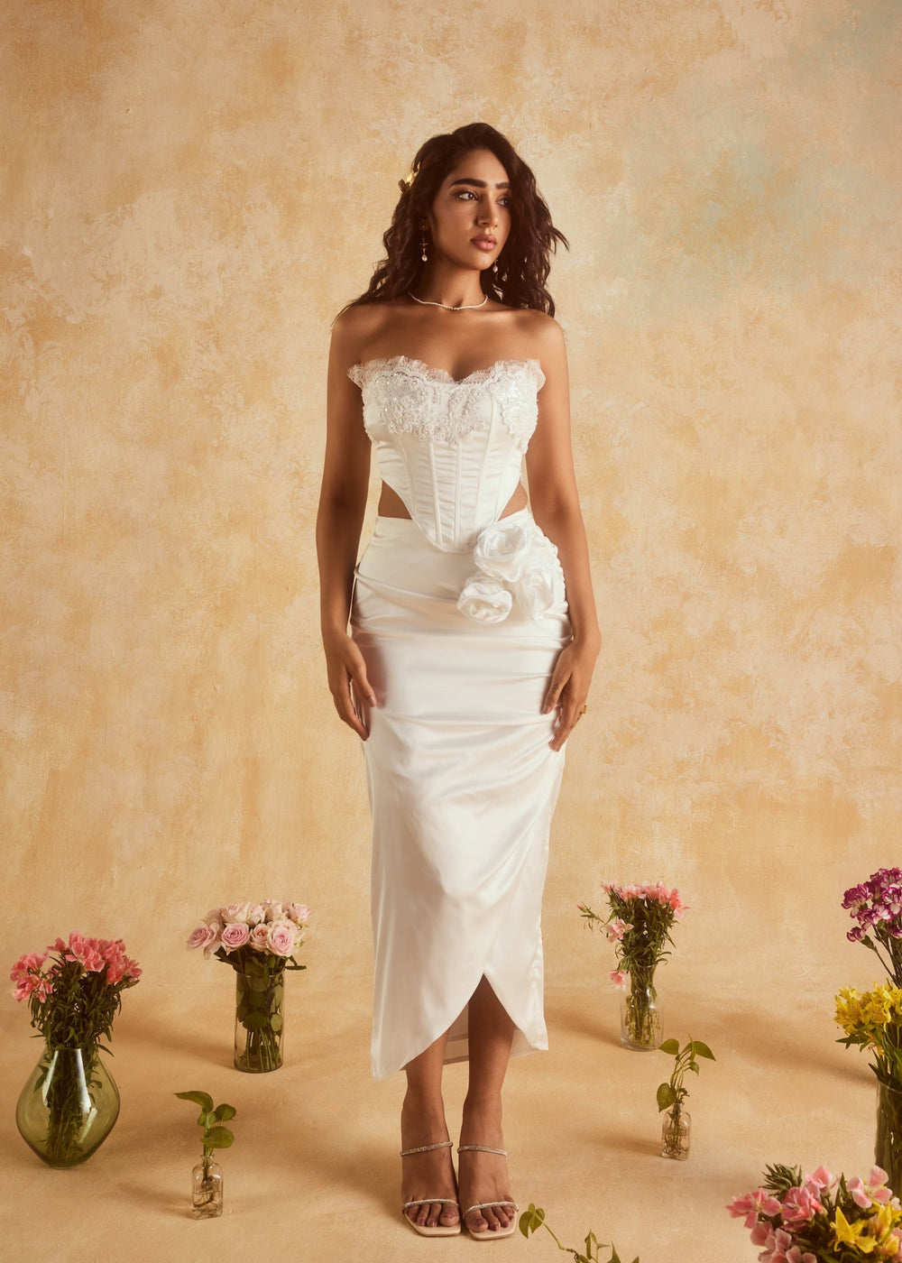 Cataleya White Embellished Corset and Skirt Set, featuring a stunning ensemble adorned with intricate embellishments in crisp white.