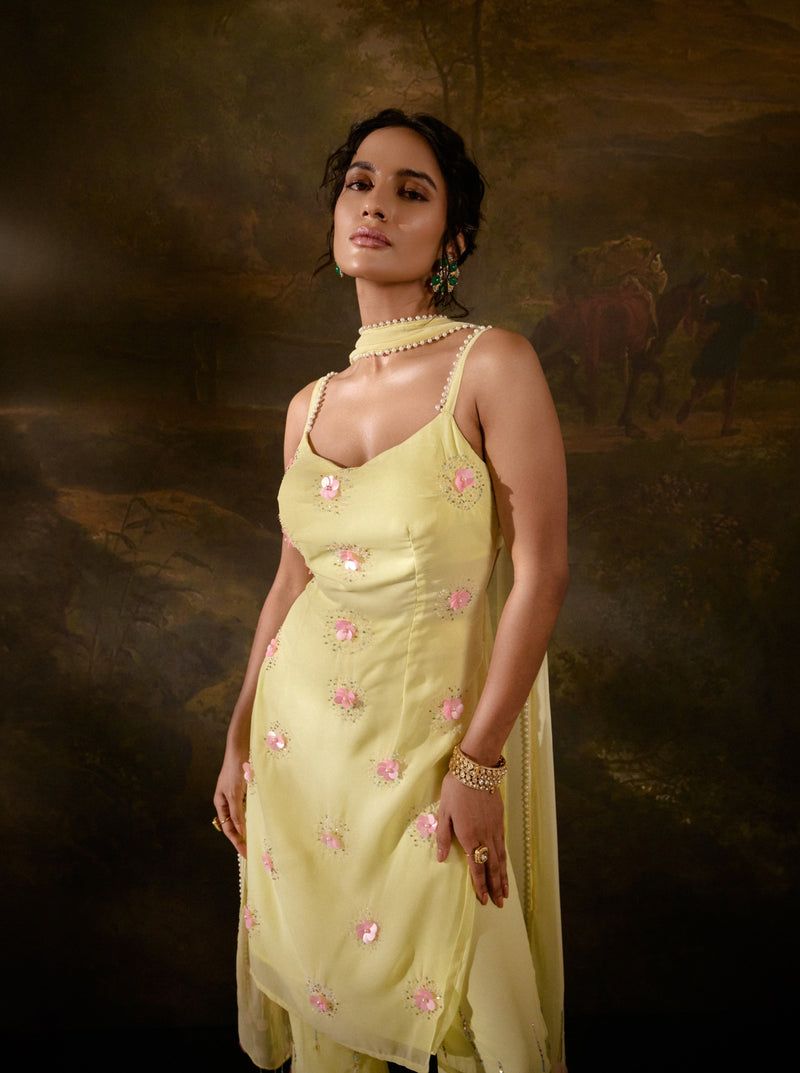 "Chanda Yellow Embroidered Kurta Set: Bright yellow kurta set adorned with intricate embroidery for a traditional yet vibrant look."