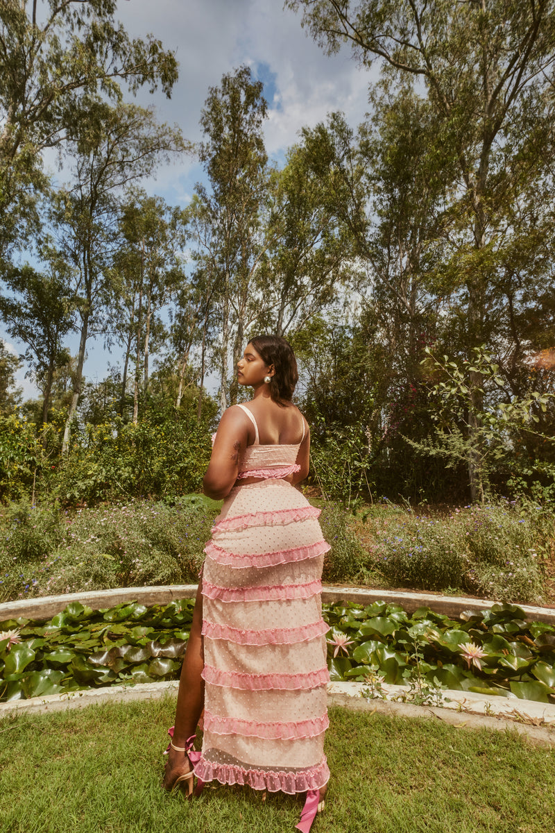 Dareia Pink & Peach Ruffled Bustier Skirt Set with a ruffled bustier top and a coordinating skirt in pink and peach hues