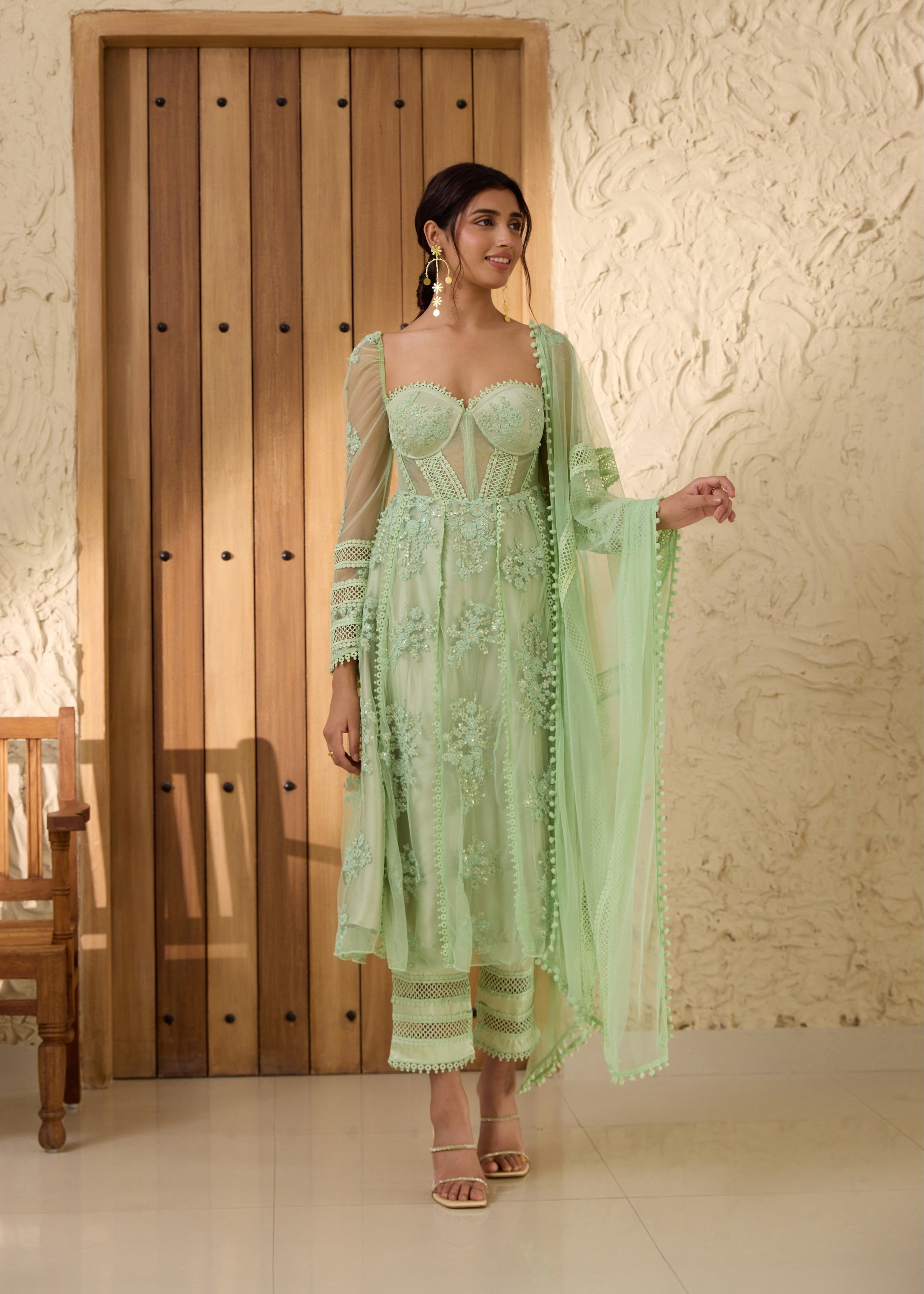Fariha Green Embroidered Corset Anarkali Suit Set featuring detailed embroidery and a flowing Anarkali silhouette