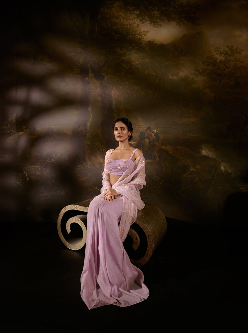 "Heer Lavender Embroidered Pre-Draped Saree: Lavender saree with intricate embroidery, pre-draped for effortless elegance and charm."