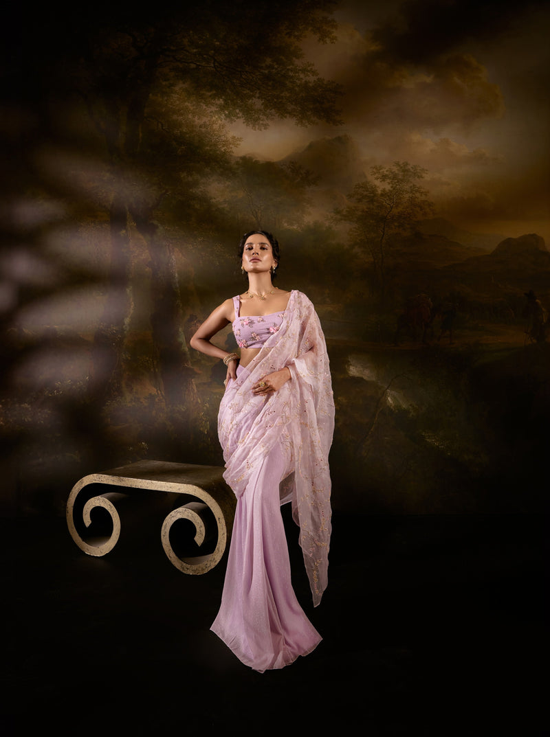 "Heer Lavender Embroidered Pre-Draped Saree: Lavender saree with intricate embroidery, pre-draped for effortless elegance and charm."