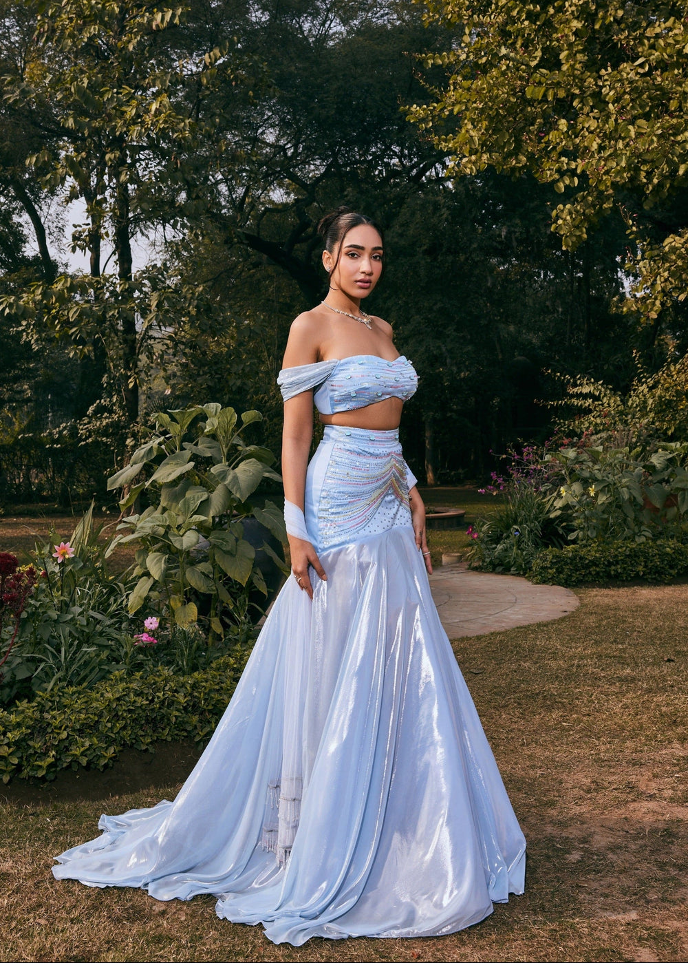 Jasmine Powder Blue Satin and Shimmer Chiffon Lehenga Set featuring a blend of satin and shimmer chiffon in a soft powder blue hue