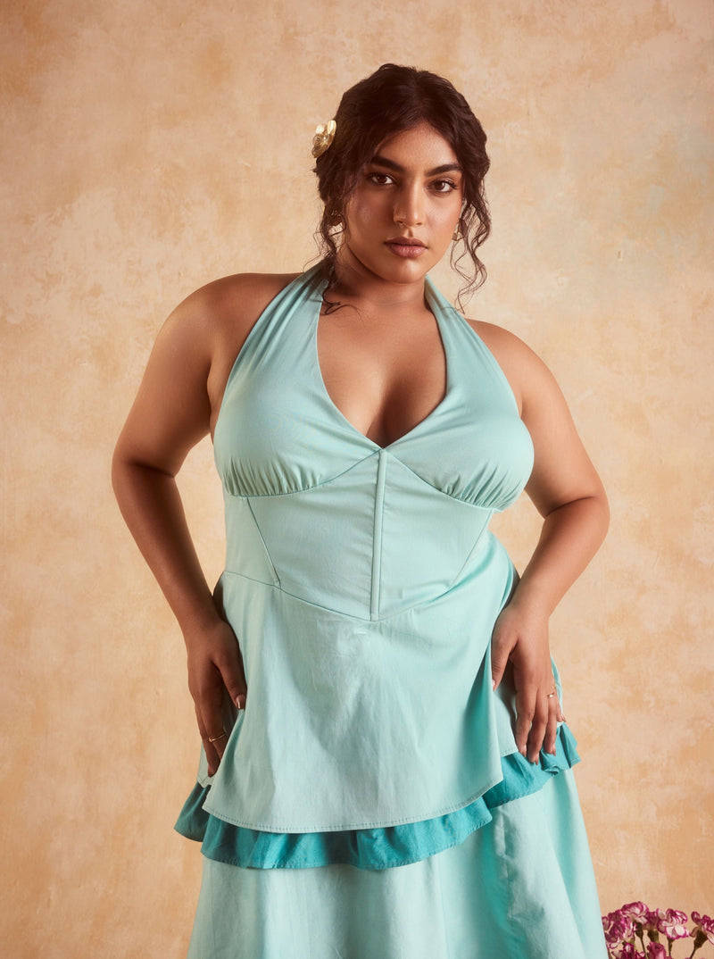 Lova Teal Corset Ruffled Dress, featuring a fitted bodice and elegant ruffled skirt in a striking teal color.