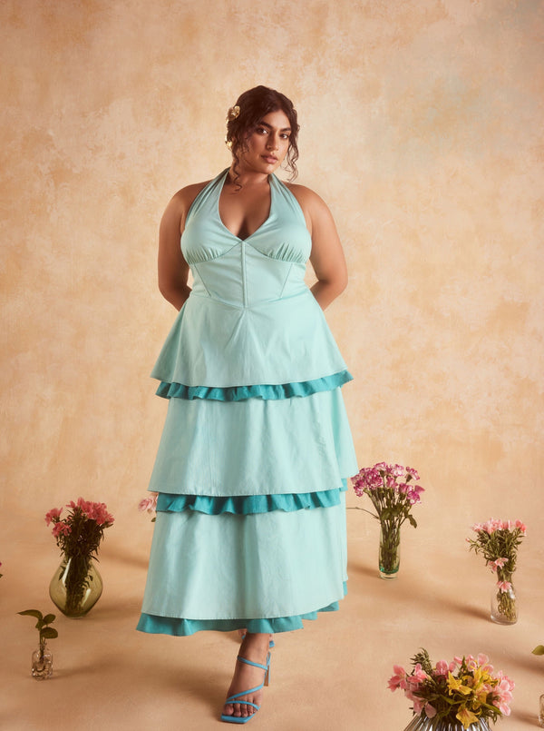 Lova Teal Corset Ruffled Dress, featuring a fitted bodice and elegant ruffled skirt in a striking teal color.