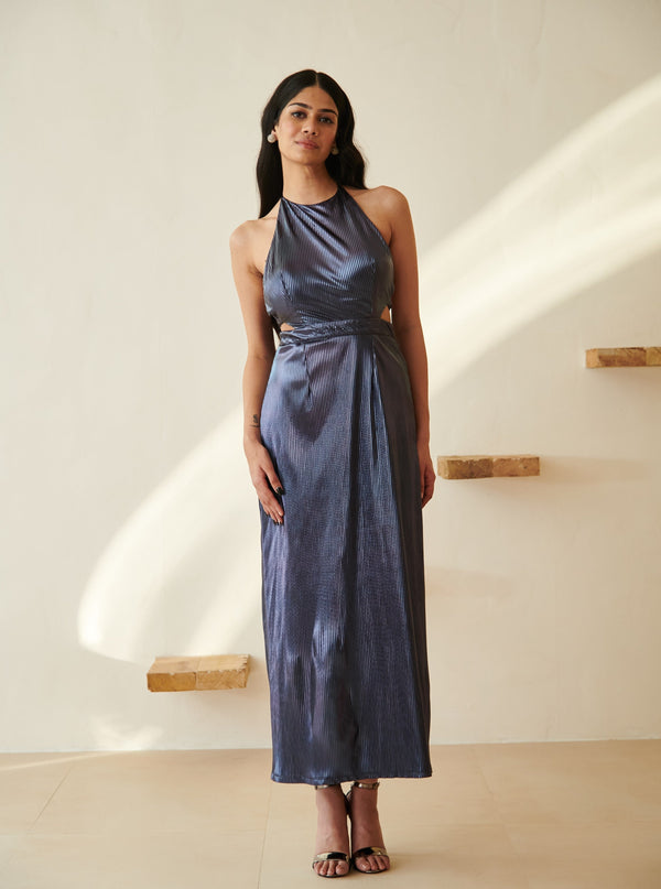 Elegant woman in a Moana Navy Blue Metallic Maxi Dress posing gracefully