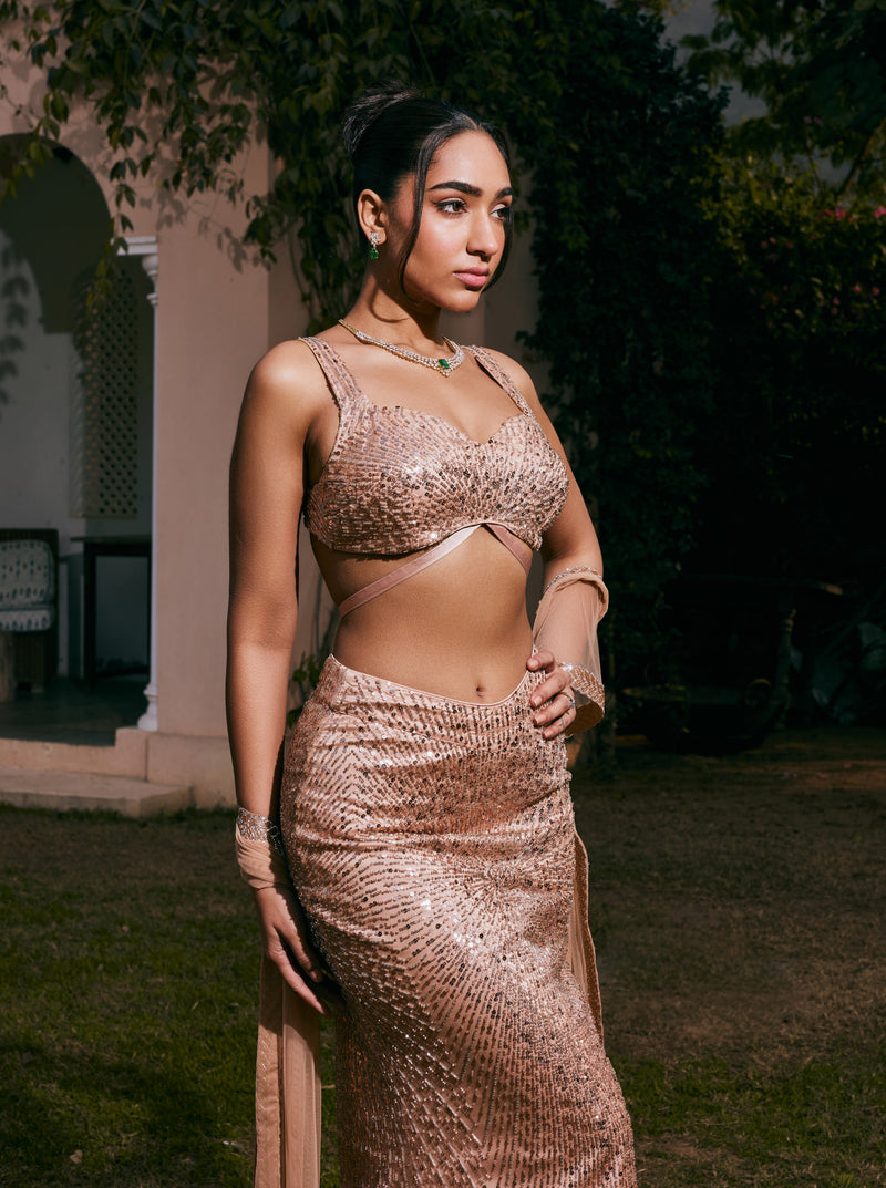 Nazia Rose Gold Hand-Embroidered Mermaid Lehenga Set featuring elegant rose gold embroidery on a mermaid-style lehenga