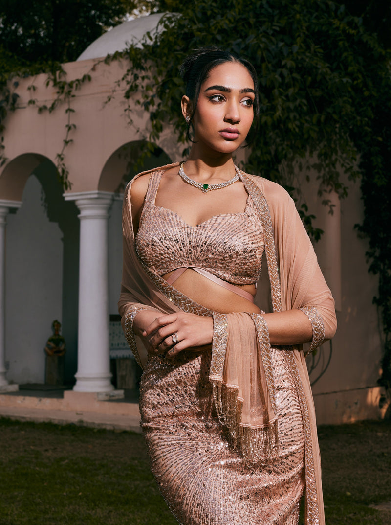 Nazia Rose Gold Hand-Embroidered Mermaid Lehenga Set featuring elegant rose gold embroidery on a mermaid-style lehenga