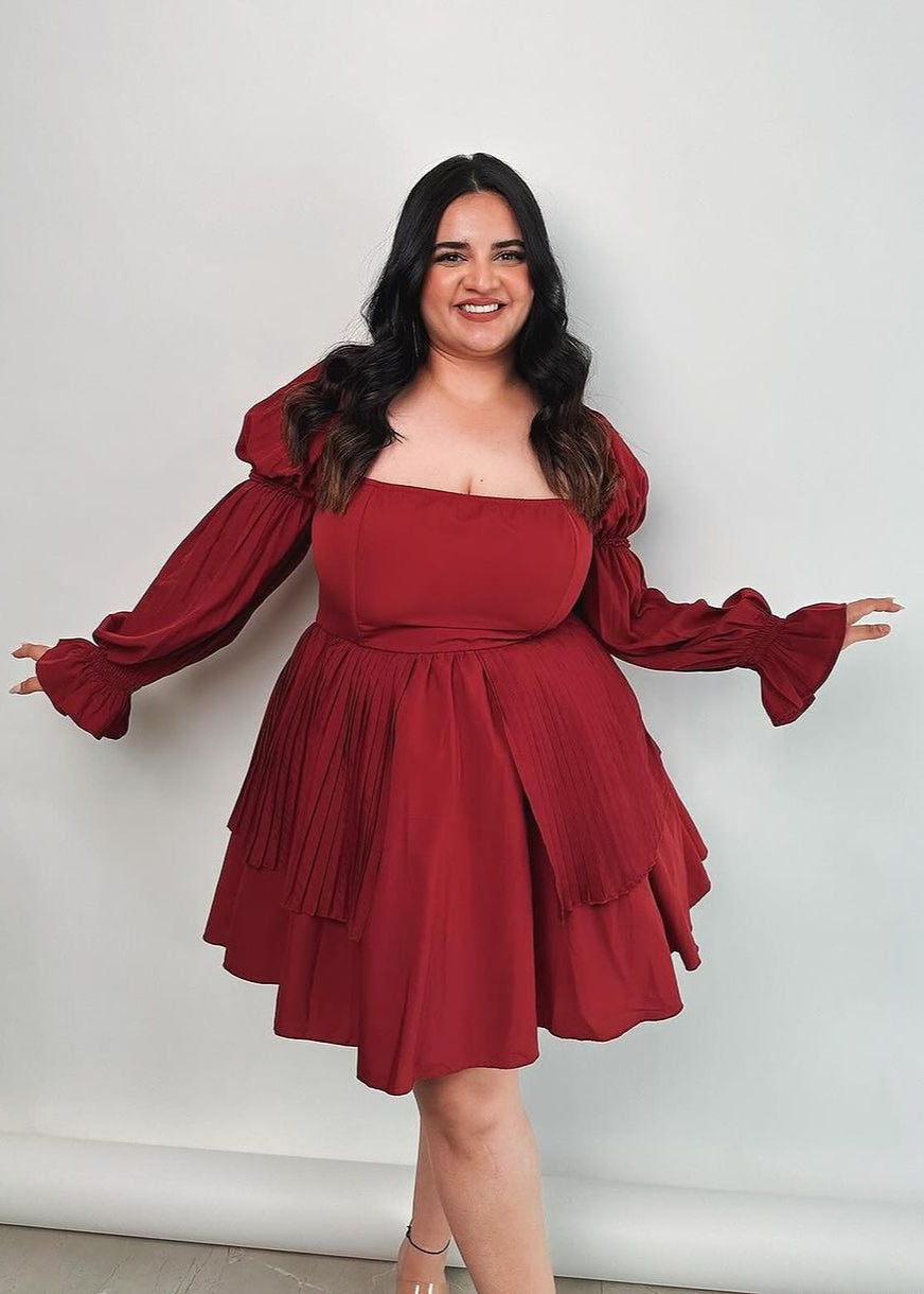  Pixie Burgundy Puff Corset Dress featuring a rich burgundy color and dramatic puff sleeves.