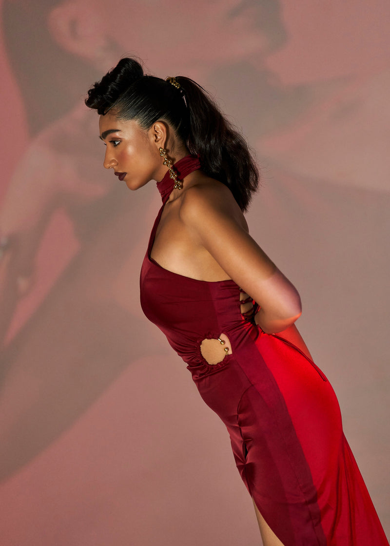 Roux Burgundy Stretch Satin Asymmetrical Cutout Dress with a form-fitting satin fabric and bold asymmetrical cutouts