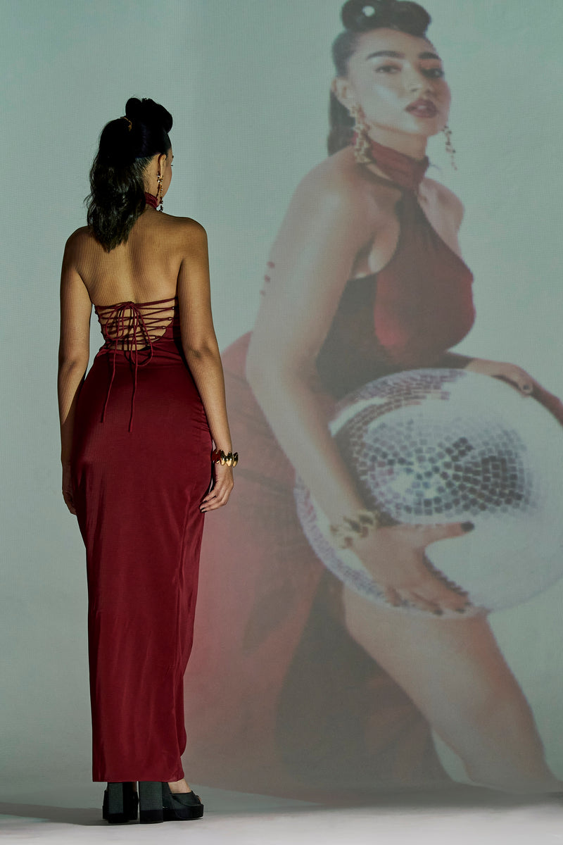 Roux Burgundy Stretch Satin Asymmetrical Cutout Dress with a form-fitting satin fabric and bold asymmetrical cutouts