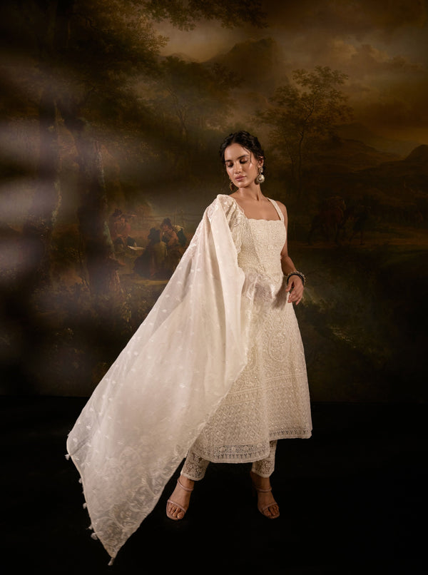"Sajoon White Organza Chikankari Corset Anarkali Suit Set: Elegant Anarkali suit set in white organza with Chikankari embroidery and a corset design."