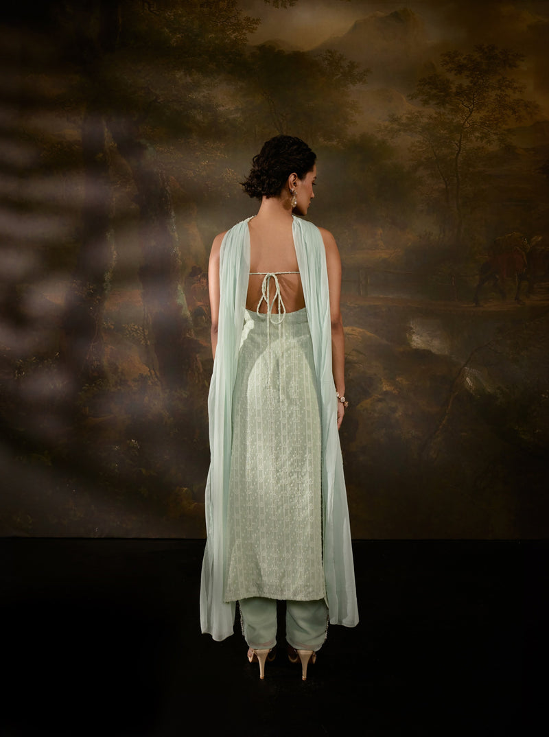 "Shimaz Sage Green Sleeveless Suit: Elegant sleeveless suit in sage green, offering a chic and modern look."