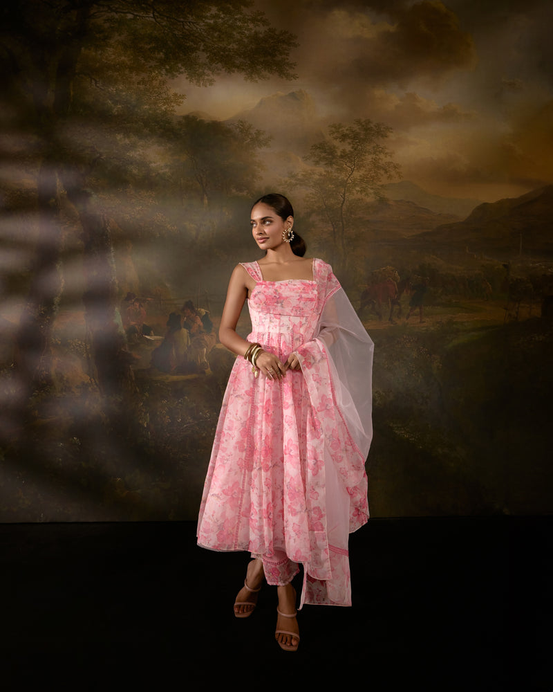 "Tanvee Pink Floral Printed Corset Anarkali Suit: Anarkali suit featuring a pink floral print corset for a graceful and