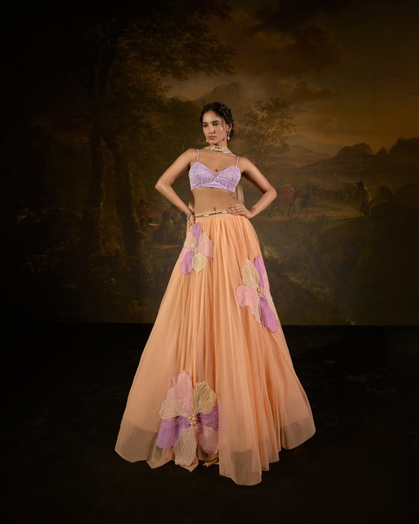 "Tasmeekh Lavender And Orange Embroidered Lehenga Set: Vibrant lehenga set with intricate embroidery in lavender and orange, perfect for a festive look."