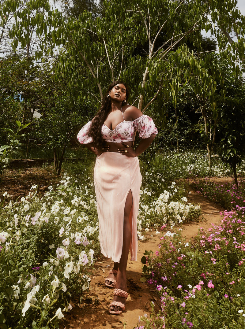 Venetia Peach Floral Top & Pleated Skirt Set with a floral-patterned top and a pleated skirt in a soft peach shade