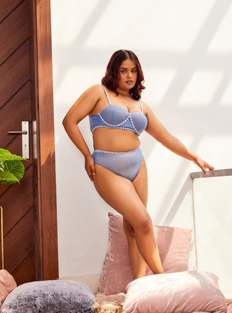 "Ximena Baby Blue Flower Embellished Full-Cup Bra - A charming full-cup bra in baby blue, adorned with intricate flower embellishments for a delicate and elegant look."