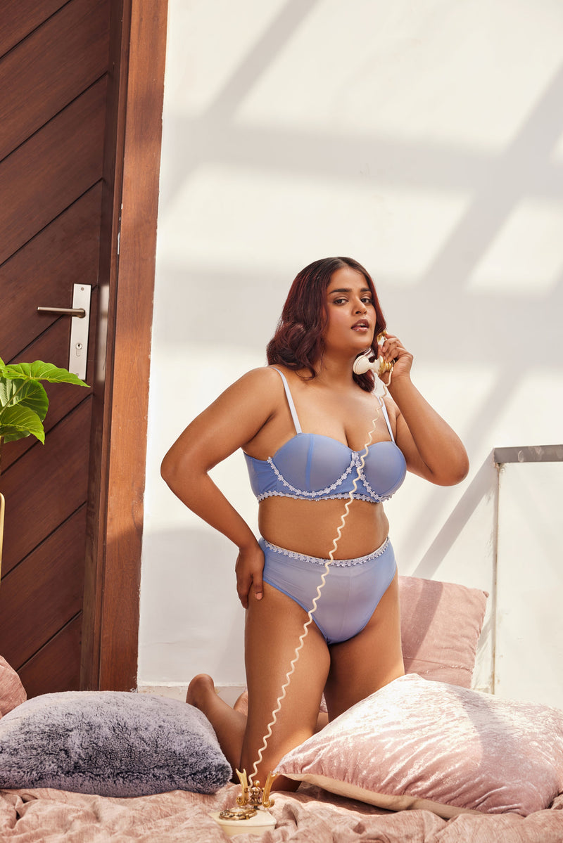 "Ximena Baby Blue Flower Embellished Full-Cup Bra - A charming full-cup bra in baby blue, adorned with intricate flower embellishments for a delicate and elegant look."