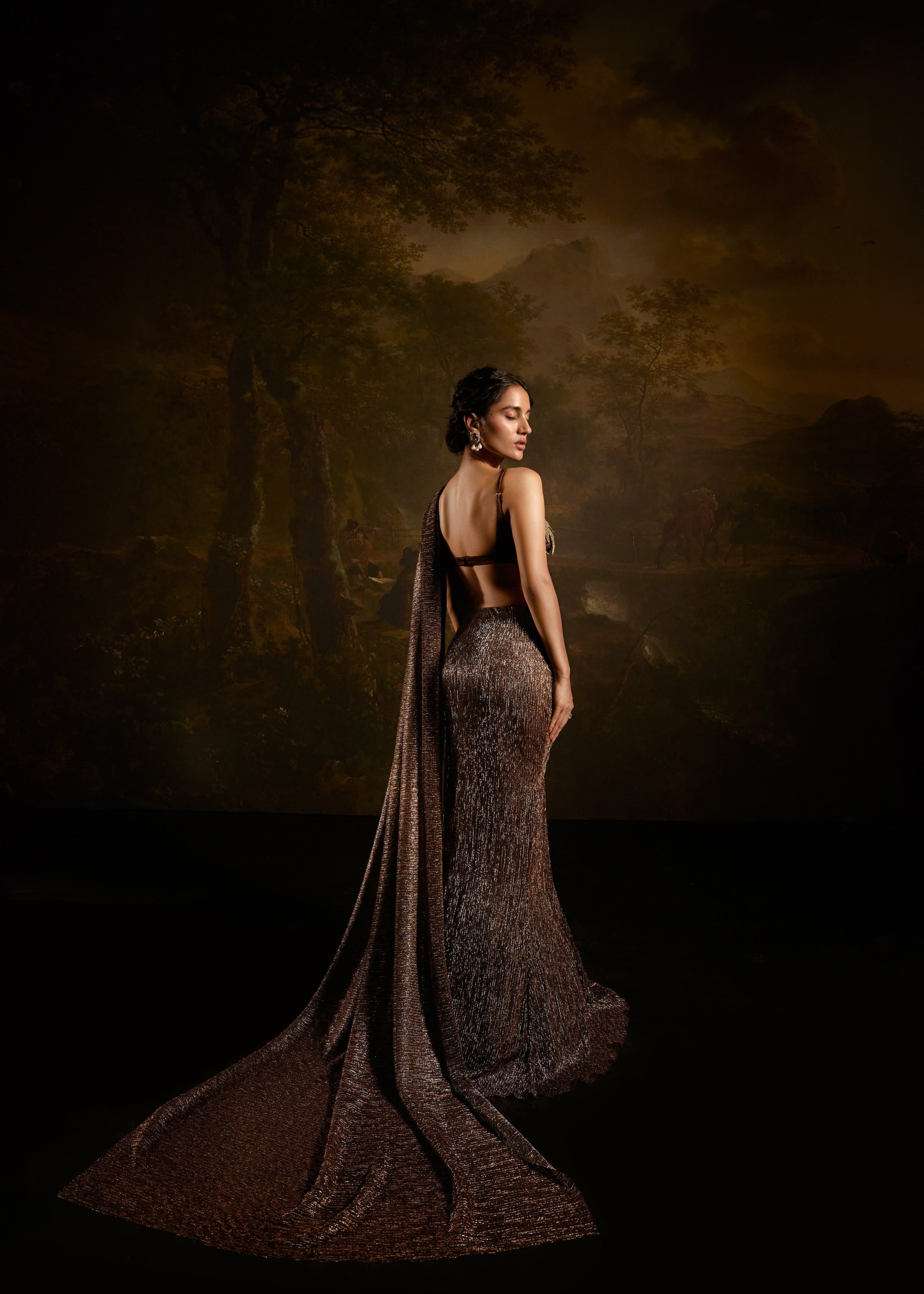 "Zaalima Brown Shimmer Pre-Draped Saree: Shimmering brown pre-draped saree, exuding glamour and sophistication."