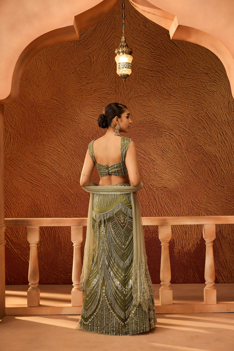 Zeenat Dark Green Heavy Embellished Lehenga
