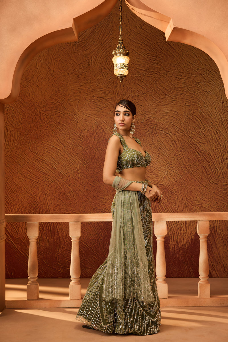 Zeenat Dark Green Heavy Embellished Lehenga
