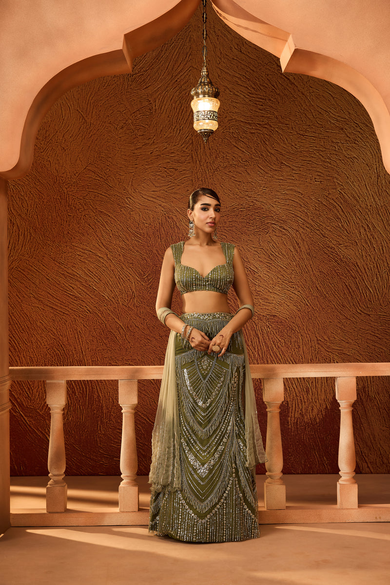 Zeenat Dark Green Heavy Embellished Lehenga
