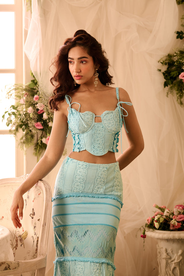 Zita Powder Blue Coord Set with a matching crop top and high-waisted pants in a soft powder blue fabric, offering a chic and coordinated look