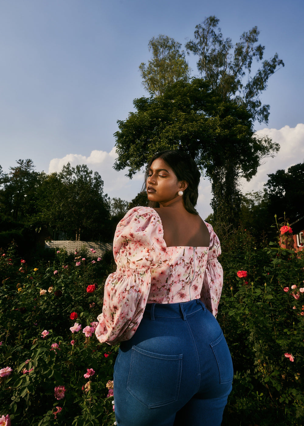 Calliope Pink Floral Print Corset featuring a delicate floral pattern in shades of pink on a corset-style design